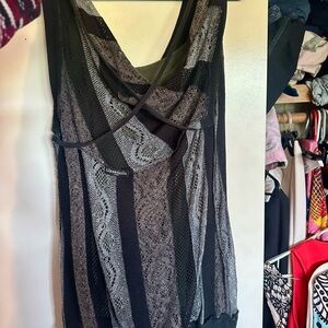 Mesh and Lacey style dark colored sleeveless long top for women size medium